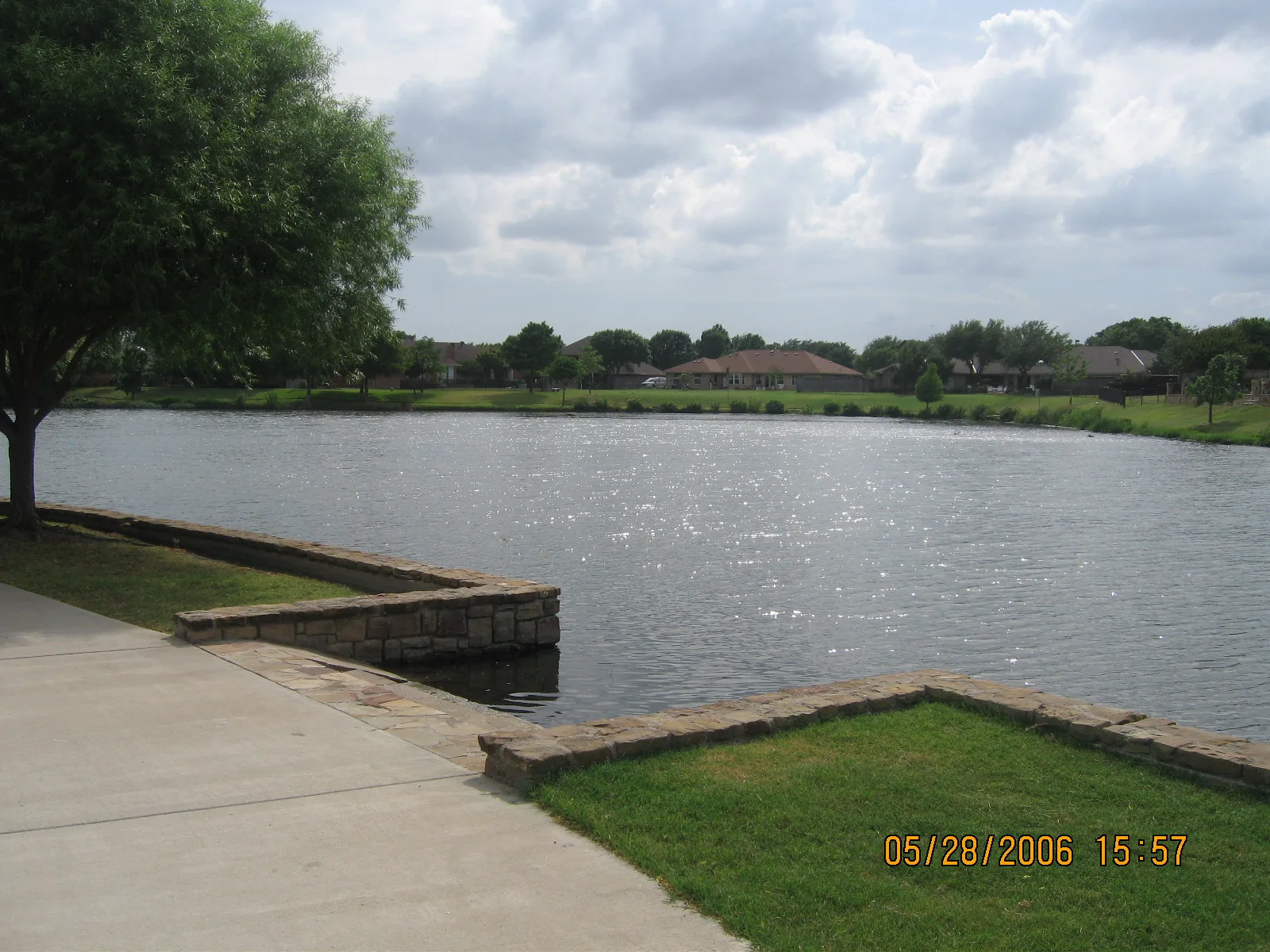 A lake and park landscape in Farmers Branch, Texas